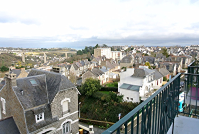 T4 avec balcons, garage et cave