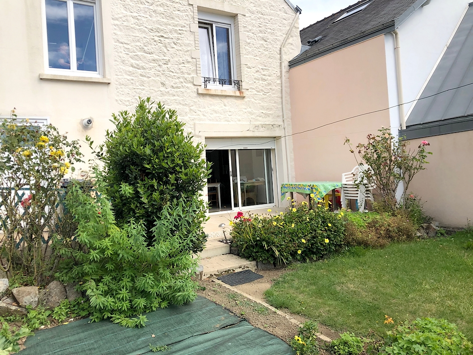 Maison de ville avec jardin au sud