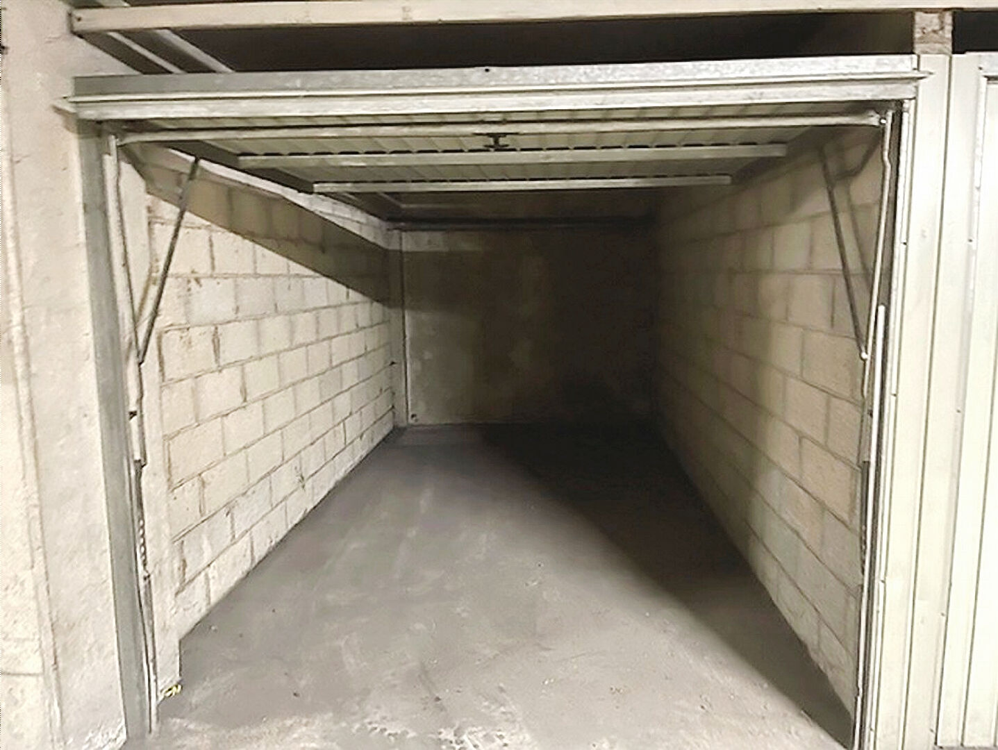 Garage en s/sol, plein centre